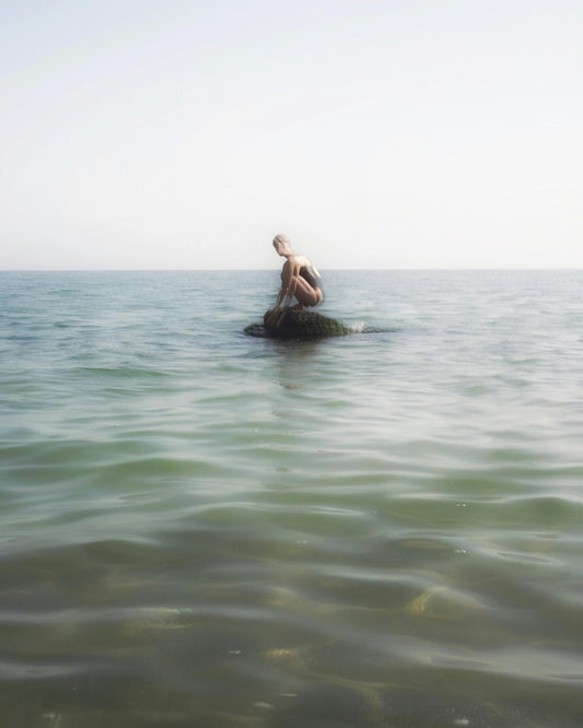Woman On Rock