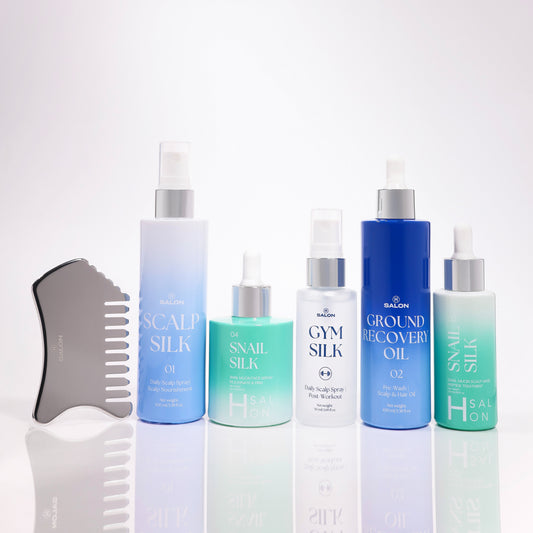 Collection of skincare and hair care products on a white background